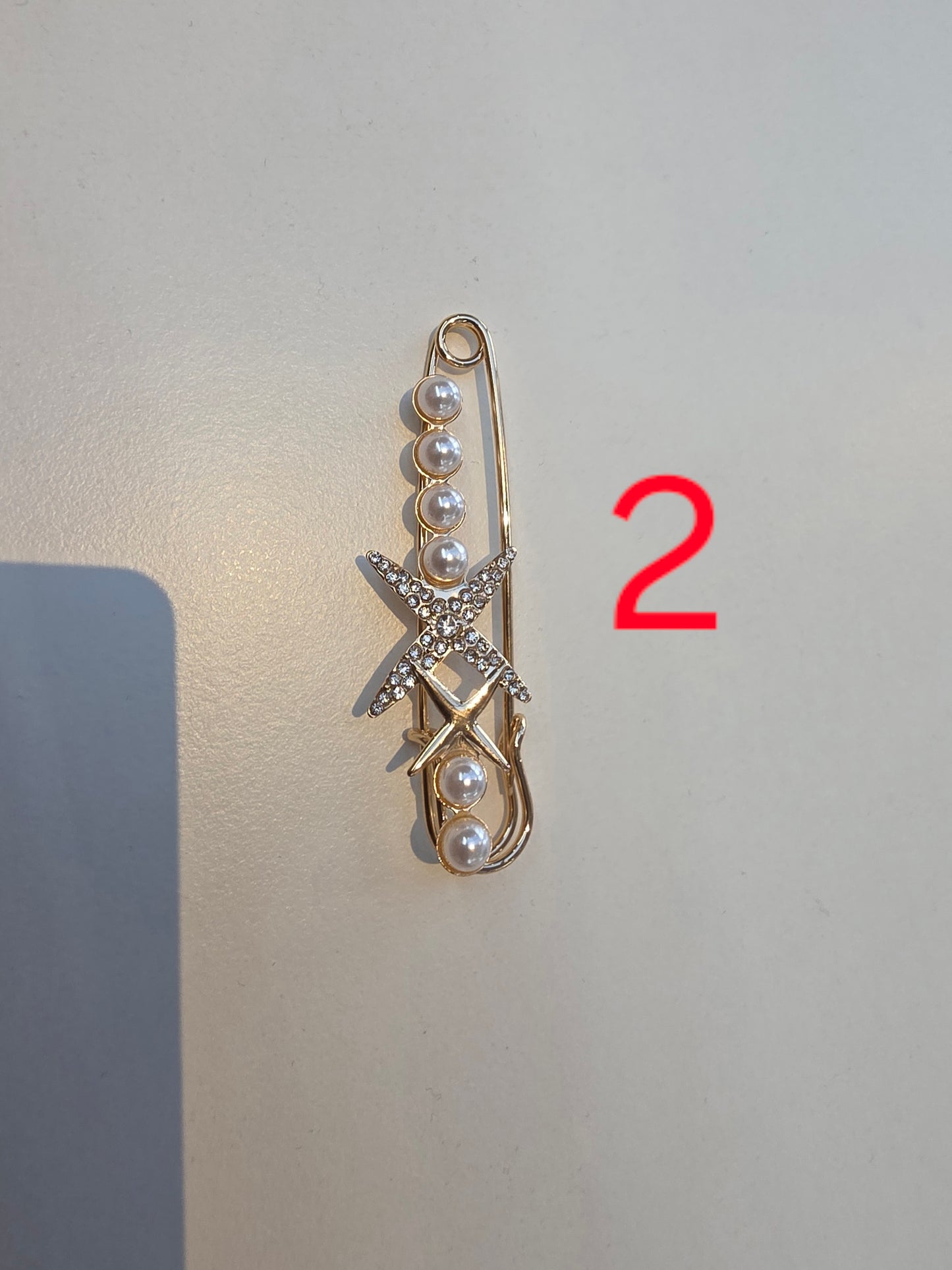 Broche-EF